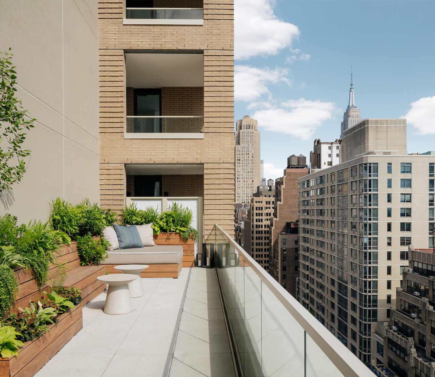 Arlo Midtown Suite hotel room terrace with seating
